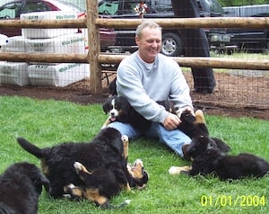 Craig Hopkins with puppies